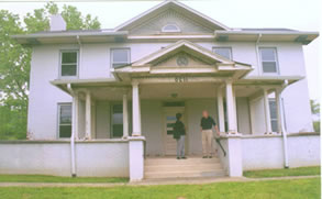 Carmon Hicks and Floyd Thomas on the front porch